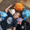 Zestaw pluszowych planet z czarną dziurą